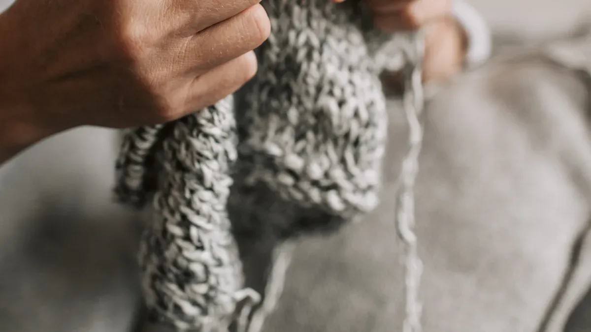 Modern knitting techniques and trends including hand knitting and knitting machines