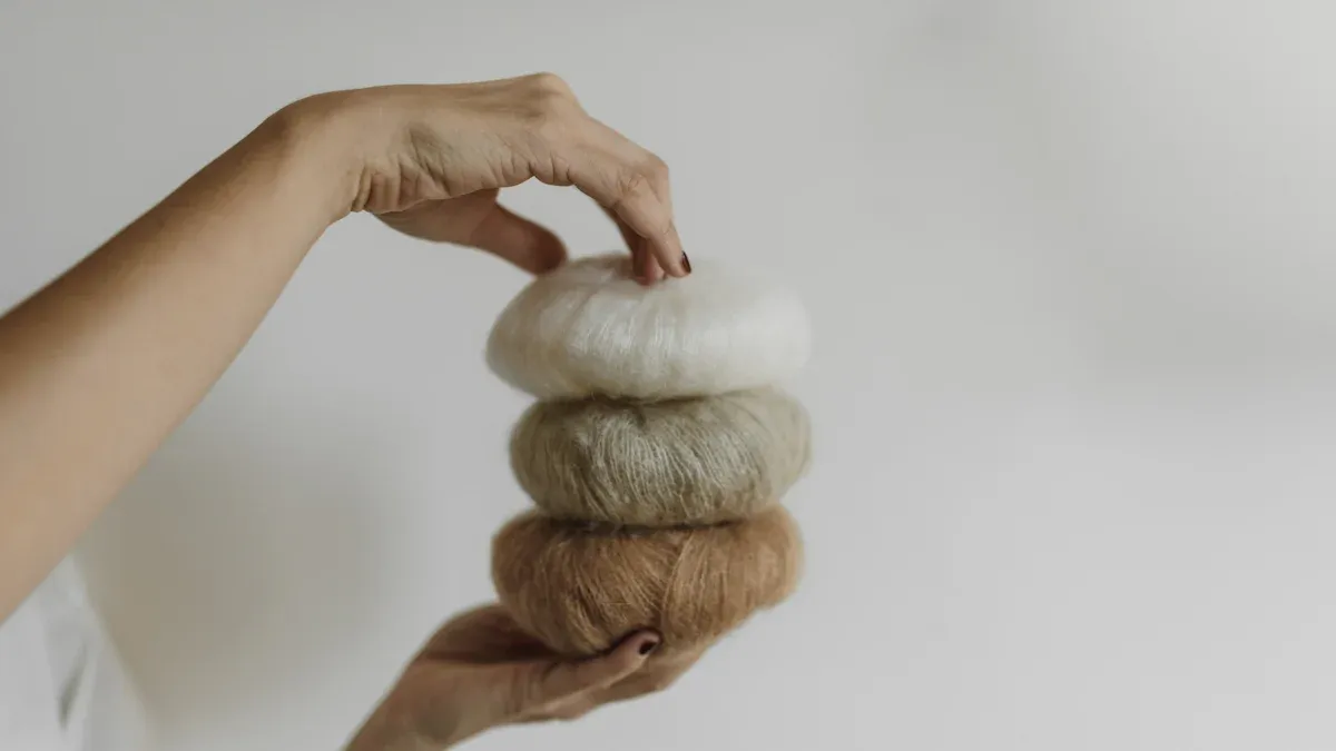 Choosing the Right Fiber: Mohair vs. Cashmere, Alpaca, and Other Luxury Yarns for Knitwear Sourcing